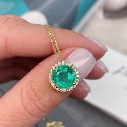 Golden Halo Round Cut Emerald Sapphire Pendant Necklace