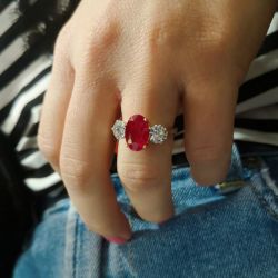 Two Tone Three Stone Oval Cut Ruby Engagement Ring