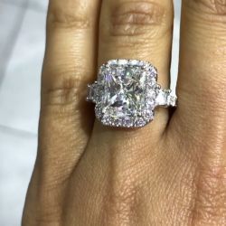 Three Stone Halo Radiant Cut Engagement Ring